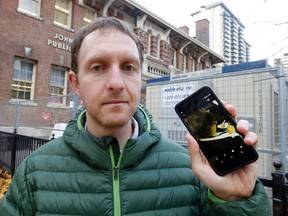 Stavros Rougas, who took a photo of TDSB trustee Gerri Gershon playing a Scrabble-like game on her phone during a boisterous meeting against building a large condo beside John Fisher Junior Public School, is seen outside the school on Wednesday, November 16, 2016. (Michael Peake/Toronto Sun)