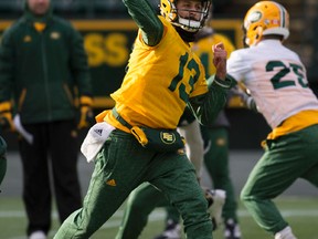 Mike Reilly was back at practice Wednesday showing no obvious signs of ongoing repercussions from Sunday's apparent arm discomfort. (Greg Southam)