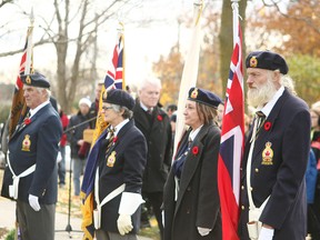 Standing still and holding the flags with pride.(Shaun Gregory/Huron Expositor)