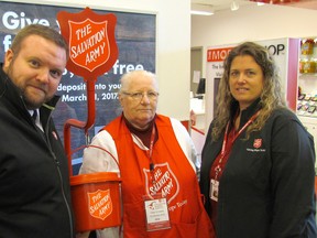The Salvation Army in Sarnia has launched its Christmas Kettle Campaign and volunteers will be accepting donations at locations in the city until the end of December. Donations will support Salvation Army community services throughout the year. From left, Capt. Mark Braye, volunteer Doris Fernandes, and kettle co-ordinator Erin Pollard stand by the kettle at the Real Canadian Superstore 
on Thursday November 17, 2016 in Sarnia, Ont. 
Paul Morden/Sarnia Observer/Postmedia Network