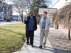 Keith Charles speaks with a paralegal outside the Provincial Offences Court in London, Ont. on Thursday November 17, 2016. (DEREK RUTTAN, The London Free Press)