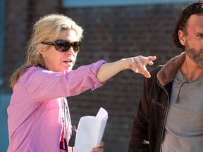 Queen’s University graduate Michelle MacLaren directs Andrew Lincoln, who portrays Rick Grimes, in an episode of The Walking Dead. (Gene Page/AMC)