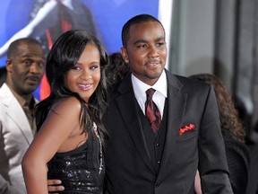 In this Aug. 16, 2012 file photo, Bobbi Kristina Brown, right, and Nick Gordon attend the Los Angeles premiere of "Sparkle" at Grauman's Chinese Theatre in Los Angeles. (Photo by Jordan Strauss/Invision/AP, File)