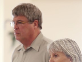 Louise Moody, executive director of Northern Frontenac Community Services Corporation, and David Townsend, executive director of Southern Frontenac Community Services Corporation, address Frontenac County council in Glenburnie on Wednesday.