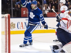 Toronto Maple Leafs left wing James van Riemsdyk reacts after scoring on Florida Panthers goalie James Reimer during second period NHL hockey action in Toronto on Thursday, November 17, 2016. (THE CANADIAN PRESS/Nathan Denette)