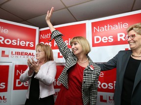 Nathalie Des Rosiers, middle, celebrates her Ottawa-Vanier byelection with Madeleine Meilleur, left,  and Premier Kathleen Wynne on Nov. 17, 2016. (Jean Levac/Postmedia Network)