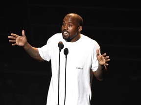 In this Aug. 28, 2016, file photo, Kanye West appears at the MTV Video Music Awards at Madison Square Garden in New York. Fan video shows West telling a crowd at his show in San Jose, Calif. Nov. 17, 2016, that he didn’t vote in the presidential election, but if he had, he would have voted for Republican President-elect Donald Trump. (Photo by Chris Pizzello/Invision/AP, File)