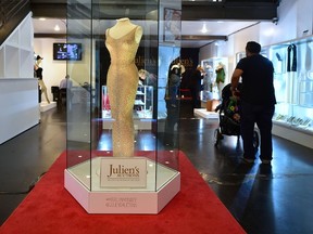 The dress worn by Marilyn Monroe when she sang "Happy Birthday Mr. President" to US President John F. Kennedy in May 1962, is displayed in a glass enclosure at Julien's Auction House in Los Angeles, California on November 17, 2016. / AFP PHOTO / Frederic J. BROWNFREDERIC J. BROWN/AFP/Getty Images