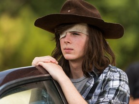 Carl Grimes (played by Chandler Riggs) in a scene from The Walking Dead episode, 'Go Getters.' (Supplied Photo)