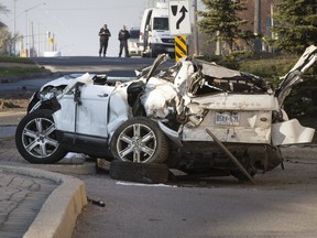 A teen was killed and the driver and another passenger sustained critical injuries after a vehicle failed to navigate a turn in the road and ended up in a mall parking lot at 14th Avenue and Markham Rd. in Markham on Friday, Nov. 18, 2016. (Stan Behal/Toronto Sun)