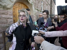 Susan Horvath, daughter of Arpad Horvath, one of the alleged victims of long-term care provider Elizabeth Wettlaufer, talks to the media following a video appearance by the accused in Woodstock, Ont. on Friday November 18, 2016. Craig Glover/The London Free Press/Postmedia Network