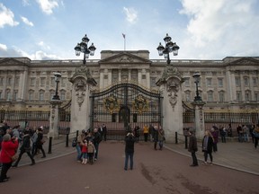 Tourists take pictures outside Buckingham Palace in central London in November 18, 2016. Officials have said that the palace is to undergo a major ten year refurbishment, costing more than £360 million. / AFP PHOTO / Daniel LEAL-OLIVASDANIEL LEAL-OLIVAS/AFP/Getty Images