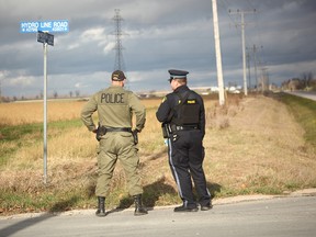 The police had the whole area on lockdown near North Line and Hydro Line. It took several officers and a tactical unit to take the suspect into custody November 16.(Shaun Gregory/Huron Expositor)