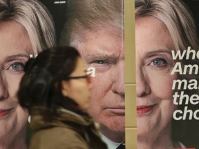 Lee Jin-man/The Associated Press
In this Wednesday, Nov. 9, 2016 photo, a woman walks by banners of Democratic presidential candidate Hillary Clinton and Republican presidential candidate Donald Trump during an election watch event hosted by the U.S. Embassy in Seoul, South Korea, on Wednesday, Nov. 9.