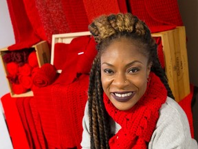 Canadian R&B artist Jully Black, who will perform at a benefit concert for the Regional HIV/AIDS Connection at the London Music Hall on Thursday, sports a red scarf to raise awareness of the illness which claimed  ? among others ? her dear friend and mentor Teddy. (CRAIG GLOVER, The London Free Press)
