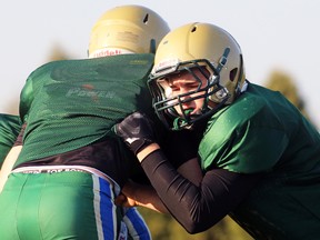 St. Patrick's Fighting Irish linebacker Justin Nixon makes a tackle during practice on Tuesday, Nov. 15, 2016 in Sarnia, Ont. The Irish will face the Northern Vikings in Saturday's LKSSAA senior boy's high school football championship game. (Terry Bridge/Sarnia Observer)
