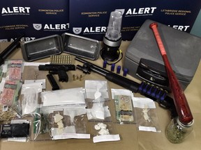 Four homes in Grande Prairie were searched as part of a drug trafficking investigation conducted by ALERT on Nov. 16, 2016. Three firearms and more than $40,000 in drugs and cash were seized.