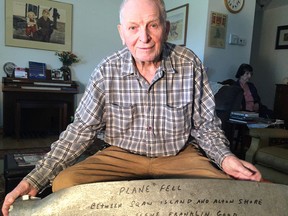 Melville Good with a propeller from the 1930 plane crash he and his father witnessed on Long Lake north of Kingston in 1930. (Patrick Kennedy/The  Whig-Standard)