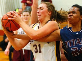 Peterborough St. Peter's Saints vs. Belleville St. Theresa Titans in the COSSA AAA senior girls basketball final, Thursday in Peterborough. (Peterborough Examiner photo by Clifford Skarstedt)