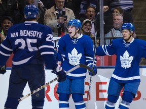 Maple Leafs centre Mitchell Marner (centre) celebrates his goal against the Panthers during NHL action in Toronto on Thursday, Nov. 17, 2016. (Craig Robertson/Toronto Sun)