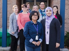 Dr. Tania Rubaiyyat, left, and Dr. Saadia Hameed join staff at the door to St. Joseph?s Family Medical and Dental Centre in London where they will soon open a new memory clinic for patients in their practice with dementia. (DEREK RUTTAN, The London Free Press)