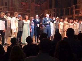 In this image made from a video provided by Hamilton LLC, actor Brandon Victor Dixon who plays Aaron Burr, the nation’s third vice president, in "Hamilton" speaks from the stage after the curtain call in New York, Friday, Nov. 18, 2016. Vice President-elect Mike Pence is the latest celebrity to attend the Broadway hit "Hamilton," but the first to get a sharp message from a cast member from the stage. (Hamilton LLC via AP)
