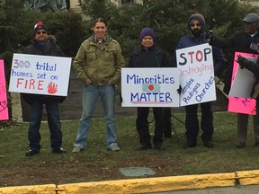 MP Robert-Falcon Ouellette with other humanitarian rally supporters at Legislatve grounds on Saturday. (Jim Bender/Winnipeg Sun/Postmedia Network)