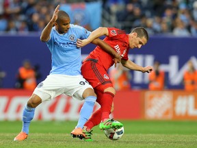 Toronto FC’s and Will Johnson battles for the ball with Tony New York City FC’s Taylor. Johnson won’t seem many minutes against Montreal on Tuesday, but you won’t here him complain. (Getty Images)