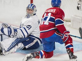 Toronto Maple Leafs goaltender Frederik Andersen looks back after being scored on by Montreal Canadiens' Alex Galchenyuk (not shown) as Canadiens' Brendan Gallagher looks for the rebound during second period NHL hockey action in Montreal, Saturday, November 19, 2016. (THE CANADIAN PRESS/Graham Hughes)