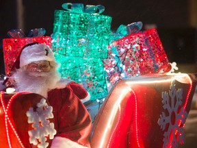 Santas Parade of Lights shut down one lane of Jasper Avenue an other downtown streets  on November 19, 2016 and finished in Churchill Square. Santa arrived in a horse drawn sleigh at the rear of a lit night time moving festival that lasted about 40 minutes. Photo by Shaughn Butts / Postmedia