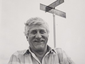 Former mayor and reeve of Gloucester Mitch Owens under the sign of the street he lives on, and was named after him in 1992. Mitch Owens died at the age of 95 in November of 2016. Wayne Hiebert, Postmedia