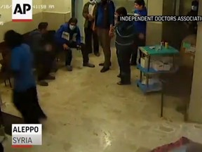 A still from a video obtained by The Associated Press shows a hospital in Aleppo, Syria, moments before it is hit by an airstrike. (AP Video screenshot)