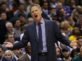 Golden State Warriors head coach Steve Kerr reacts to a call during an NBA game against the Milwaukee Bucks on Nov. 19, 2016 in Milwaukee. (AP Photo/Aaron Gash)