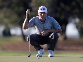 Mackenzie Hughes of Canada lines up his putt on the 15th hole during the final round of the RSM Classic at Sea Island Resort Seaside Course on Nov. 20, 2016 in St Simons Island, Georgia. (Streeter Lecka/Getty Images)