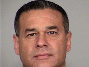 This undated image released by the San Antonio Police Department shows 20-year police veteran, Det. Benjamin Marconi, 50, who was shot and killed Sunday, Nov. 20, 2016, while on duty in San Antonio, Texas. Marconi was shot to death in his squad car while writing out a traffic ticket. (San Antonio Police Department via AP)