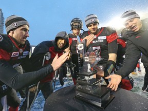 The Redblacks celebrate their win in the East final. (Jean Levac, Postmedia Network)