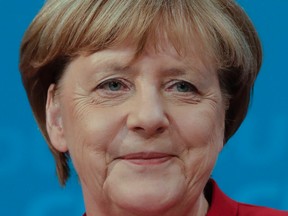 German Chancellor and chairwoman of the Christian Democratic party, Angela Merkel, addresses the media in Berlin, Germany, Sunday, Nov. 20, 2016. Chancellor Merkel said that she will run for a fourth four-year-term to become one of the longest-serving leaders of post-war Germany. (AP Photo/Markus Schreiber)