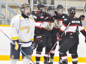 Derek Elliott (16), second from left, of the Mitchell Hawks celebrates his third goal of the night last Friday in a 4-0 win over visiting Wingham in Provincial Junior Hockey League (PJHL) Pollock Division action. ANDY BADER MITCHELL ADVOCATE