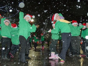 The weather outside was a far cry from delightful Saturday night as the hundreds of people lining the downtown square for the annual Santa Claus parade in Goderich were pelted with hail. However, most didn’t seem to mind as they were soaking in the start of the holiday season with the parade that boasted over 50 floats. Pictured is a group of youth who frolicked in choreographed dances to Christmas music as they participated in the event. (Darryl Coote/The Goderich Signal Star)