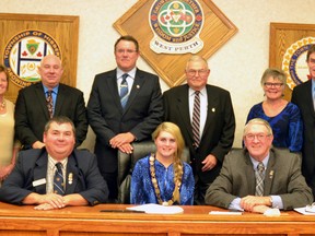 Mayor for a Day Wendy Harper (centre chair) presided over the Nov. 14 West Perth council meeting, where she read motions and kept councillors on topic all night. Posing are council members (back row, left): Cheri Bell, Cheryl Matheson, Mike Tam, Dean Trentowsky, Bob Burtenshaw, Annamarie Murray, Nicholas Vink and CAO Jeff Brick. Front (left): Deputy Mayor Doug Eidt and Mayor Walter McKenzie sit between “Mayor” Harper. GALEN SIMMONS MITCHELL ADVOCATE