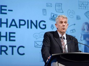 Jean-Pierre Blais, CEO of the Canadian Radio-television and Telecommunications Commission, addresses the Canadian Chapter of the International Institute of Communications, Wednesday, Nov. 16, 2016 in Ottawa. THE CANADIAN PRESS/Justin Tang