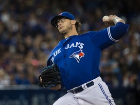 Toronto Blue Jays' Brett Cecil pitches against the Oakland A's in Toronto on April 24, 2016. (Craig Robertson/Toronto Sun/Postmedia Network)