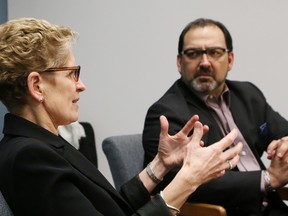 Ontario Premier Kathleen Wynne and Glenn Thibeault during an editorial meeting with the Sudbury Star in Sudbury Dec. 19, 2014. (JOHN LAPPA/Postmedia Network)