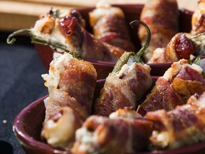 Sausage and Smoked Almond Jalapeno Poppers in an example of a tailgating set up, demonstrated in the parking lot of Weber Grill Academy in Vaughan, Ont. (Ernest Doroszuk/Toronto Sun)