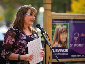 Mary Meadows of St. Thomas, a survivor of woman abuse speaks Nov. 1, at the lighting of the tree of hope in Victoria Park to kick off the Shine the Light on Woman Abuse campaign that runs throughout November.