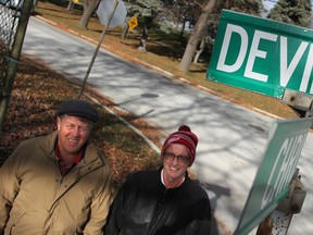 Randy Evans and Tom St. Amand pose by the intersection of Devine Street and Christina Street South in Sarnia. They recently published a research project investigating Sarnia's more-than-700 streets. (Tyler Kula/Sarnia Observer/Postmedia Network)