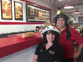 Firehouse Subs held a grand opening for its new outlet on Wellington Road earlier in November. It's only the second restaurant in Canada for the American fast food chain. Phil Dawson and Teresa Cavaliere are co-owners of the franchise along with Bill Carr. Hank Danisewski/The London Free Press/Postmedia Network