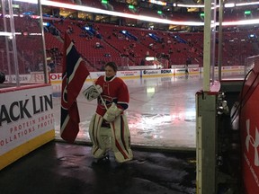 Kingston minor hockey goalie Aodhan Woogh-Dunleavy served as a flag-bearer before the Maple Leafs-Canadiens NHL game at the Bell Centre in Montreal on Saturday night. (Supplied photo)