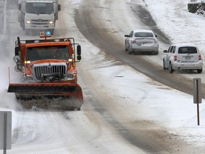 A City of Kingston snow plow clams Montreal Street at Conacher Drive during an early-season snowstorm in Kingston. (Ian MacAlpine /The Whig-Standard)