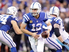 Andrew Luck of the Indianapolis Colts runs with the ball during the second half of the game against the Tennessee Titans at Lucas Oil Stadium on November 20, 2016 in Indianapolis, Indiana. (Andy Lyons/Getty Images)